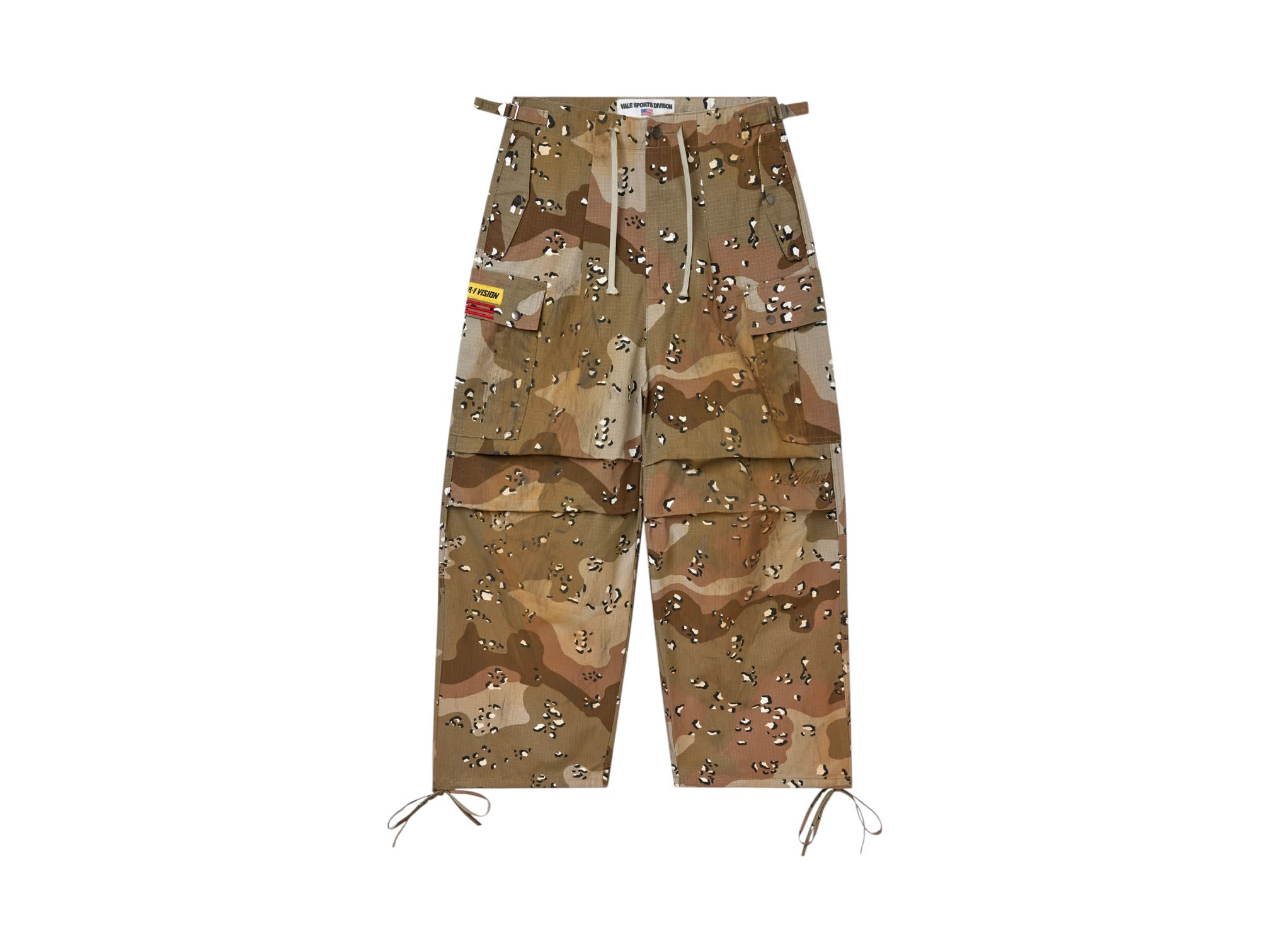 https://res.cloudinary.com/dlqdbsx2k/image/upload/v1783605477/2511_VALLEY-DREAMS_CURSIVE-WORDMARK_PARACHUTE-PANT_DRTY-TAN-CAMO_001_qhrr1v.jpg