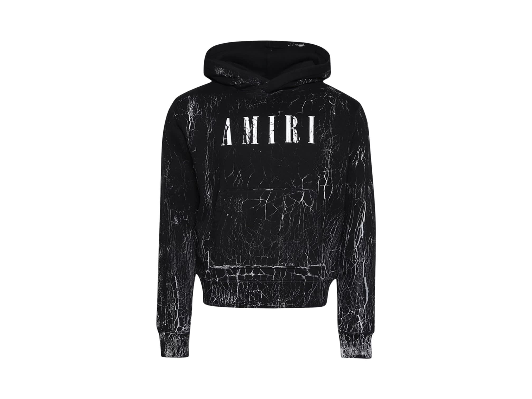 https://res.cloudinary.com/dlqdbsx2k/image/upload/v1790528970/AMIRI_Cracked_Dye_Core_Logo_Hoodie_Black_oywn8v.jpg