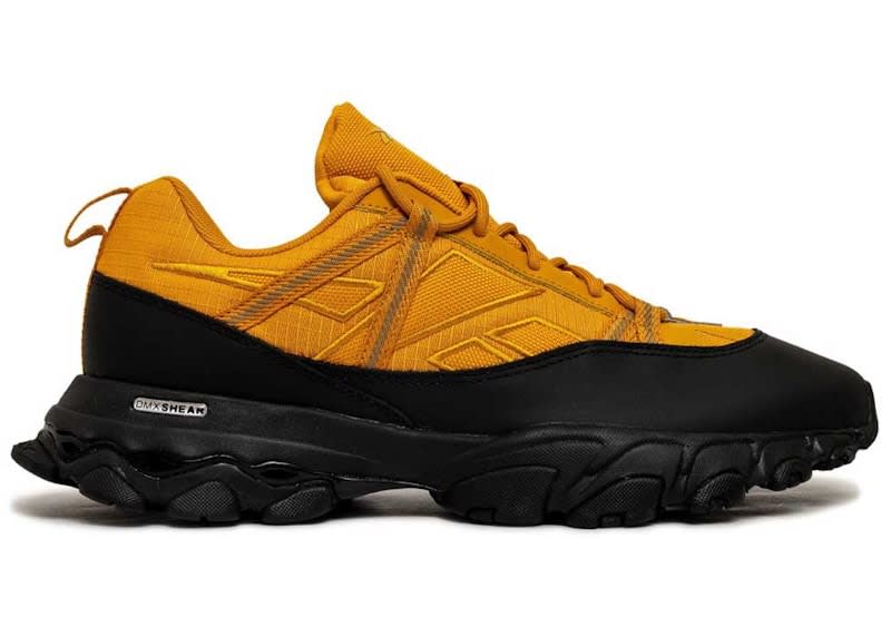 https://res.cloudinary.com/dlqdbsx2k/image/upload/v1772468551/Reebok-DMX-Trail-Shadow-Bright-Ochre-Black_y2hxpt.jpg
